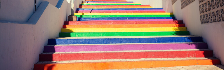 Colorful staircase in the park. The steps are painted in rainbow colors. Nerja, Malaga, Spain....