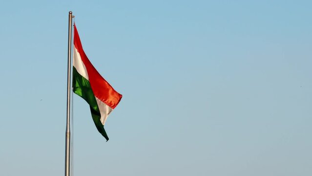 Tri color National Indian flag flying through wind during Independence/ Republic day celebration event in New Delhi India.