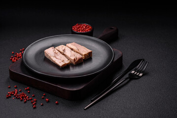 Delicious canned dietary tuna meat with salt, spices and oil