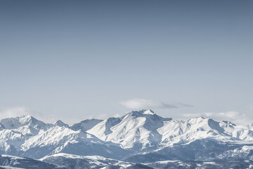 Snowcapped peaks. Winter mountain ridge.