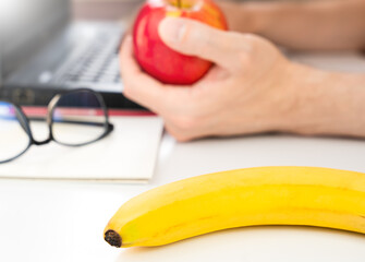A healthy snack of fruit on your desktop. Healthy eating concept. Close-up. Selective focus.