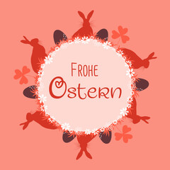 Osterdekoration mit Osterhasen, Ostereiern und deutschem Text - frohe Ostern mit rotem Hintergrund als Gru&szlig;karte zu Ostern