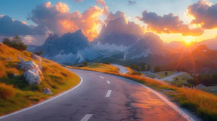 Rollo Dolomites, Italy. Beautiful curved roadway, rocks, stone, blue sky and clouds. Spring landscape with empty highway through mountain pass. © Zaleman