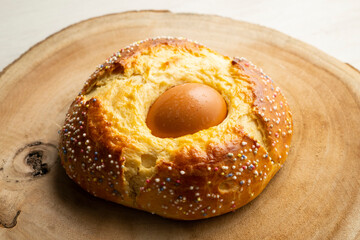 Mona de Pascua, sponge cake with boiled egg. Traditional Spanish dessert for Holy Week