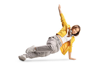 Teen female in a dance pose on the floor