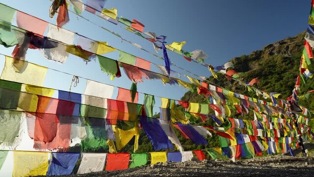 Tibetan Prayer Flags Fluttering in Dehradun Foothills, Uttarakhand, India