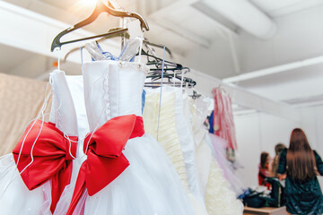 Wedding Dresses on Display with big Red bow