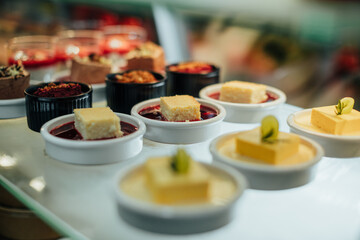 Deserts in bufet stand ready