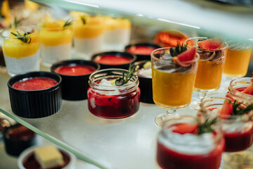 Deserts in bufet stand ready