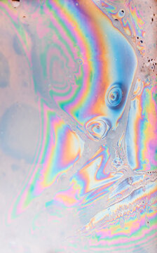 Vibrant oil and water mixture with rainbow colors