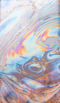 Whirling colors in iridescent soap bubble texture