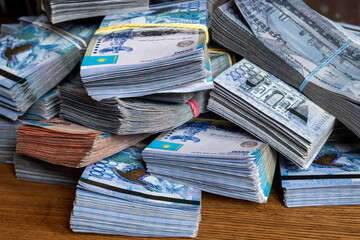 Kazakh Tenge money packs. KZT banknote bundle stacks. A lot Tenge money banknotes. Money prize...