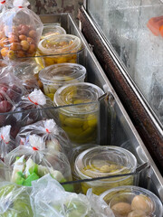 fresh fruits and vegetables in a plastic container