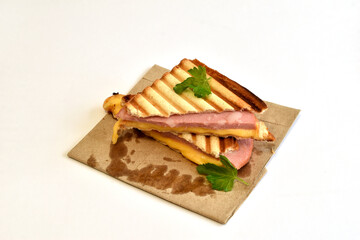 Sandwich with sausage and cheese.