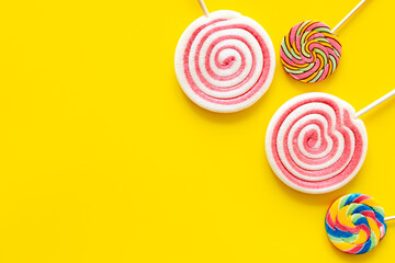 Food pattern. Many colorful lollipops. Sweet food and candies background