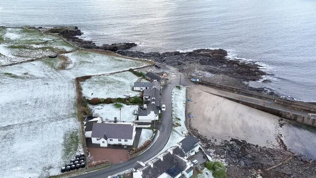 Aerial view ofa snow covered Portnoo harbour in County Donegal, Ireland.