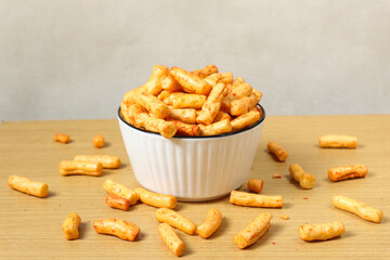 kerupuk tongkol pedas or crackers made from tuna with a spicy taste. or spicy stick snacks in a...