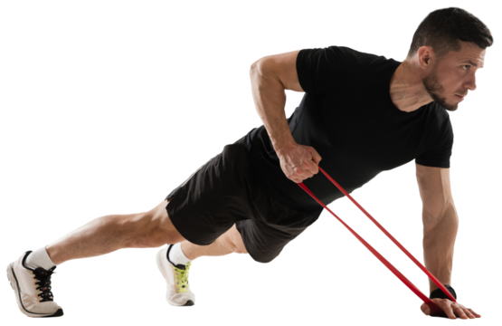 Muscular sportive man training, standing in plank positing and doing exercises with fitness band isolated on transparent background. Concept of sport, fitness, workout, healthy and active lifestyle