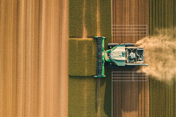 combine harvester driving on a field of agriculture