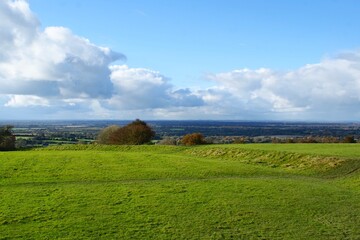 Obraz premium Hills of green rural fields in the countryside of Ireland. High quality photo