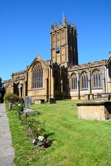 Front view of St Marys Minster Church in the town centre with the graveyard in the foreground, Ilminster, Somerset, UK, Europe. - 734962223