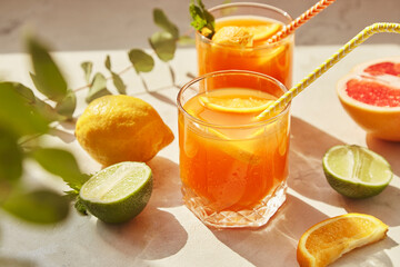 Aesthetics summer non alcoholic refreshing cocktails with orange, grapefruit, lemon and lime. Detox vitaminized drinks.