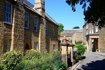Traditional hamstone buildings along Court Barton in the old town, Ilminster, Somerset, UK, Europe.