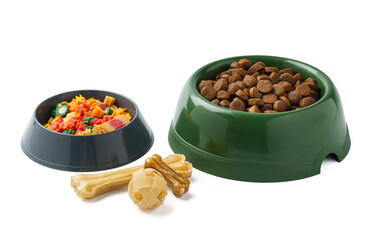 Green plastic bowl with dry pet food isolated on white