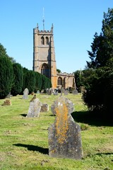 View of All Saints church tower and graveyard, Martock, Somerset, UK, Europe. - 734964451