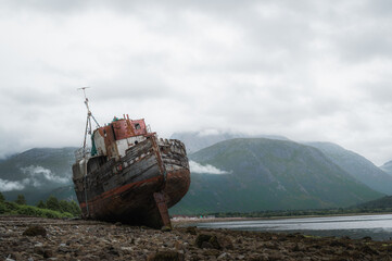 Old boat of Caol shipwreck in Corpach near Fort William on a rainy day.Tourism,scottish landmarks