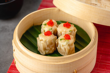 Shumai with shrimp and mushrooms, a traditional Chinese dumpling often served with dim sum
