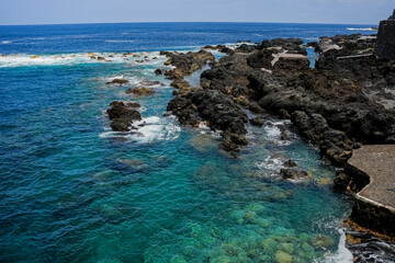 Beautiful rocks and turquoise sea on the coast of the Canary Islands, Tenerife Spain