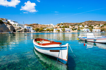 Fototapeta na wymiar Colorful fishing boat in Kimolos port, Kimolos island, Cyclades, Greece