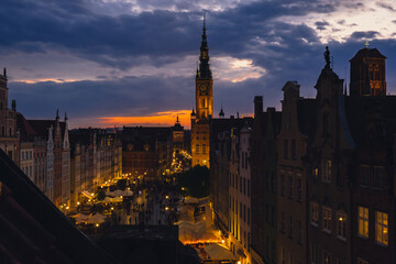 Beautiful old town in Gdansk at summer dusk Poland. Sunset night view from the window rooftop on...