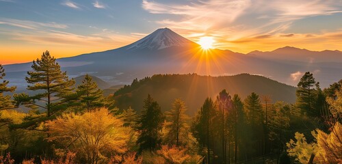 Golden sunrise bathes Mount Fuji and surrounding forest in warm hues, signaling the arrival of autumn. - obrazy, fototapety, plakaty
