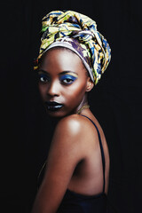 Black woman, beauty and portrait with fashion, hair scarf and makeup in studio. Cosmetics, trendy and afro style with African female person from Kenya with traditional head wrap with black background