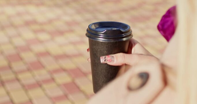 Appreciation of young woman for soothing warmth of coffee deepens. Lady discovers quiet refuge dispelling remnants of blues lingered within