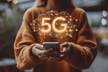 Shining holographic 5g text icon over mobile phone in hands, futuristic technology concept
