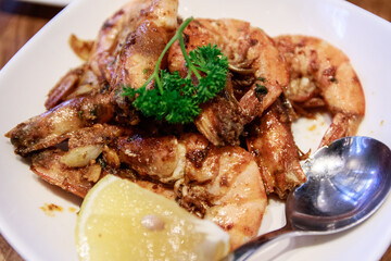 Feast of the Ocean: Grilled Seafood Delights on a White Platter
