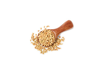 Green buckwheat in a wooden spoon isolated on a white background. Superfood. Raw buckwheat porridge. Healthy vegan food, eco products, diet, organic.