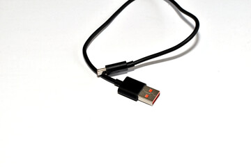 Black USB cable on a white background.