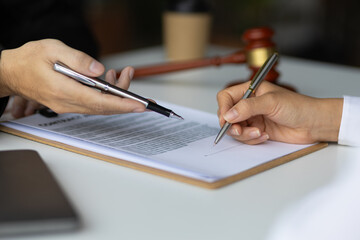 Signing a legal contract agreement. Lawyer, Legal Counsel and Legal Justice