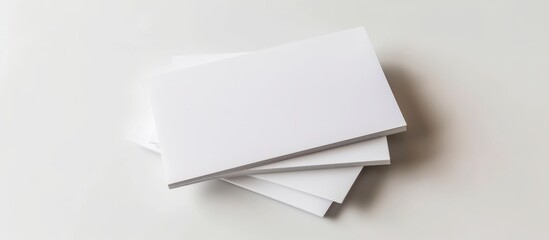 Three Blank Paper Sheets on a Clean and Bright White Background for Copy Space and Writing