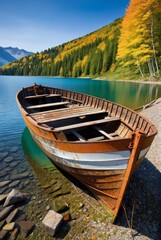 Naklejka na ściany i meble An old, rusty fishing boat rests on the shore of the lake, nestled against the slope by ai generated