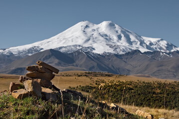 Russia, the Elbrus region. Amazing view of the snow-capped peaks of Elbrus (5642 m) from the side...