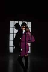 fashion pregnant model posing in studio on a  black background, studio pregnancy shoot, fashion pregnancy, pregnant woman in a dress, person in the window