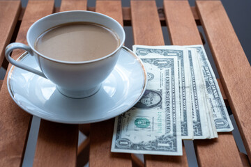 cup of coffee and dollar
