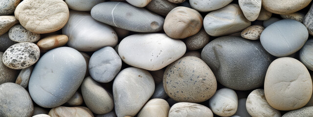 Smooth grey stones in monochrome palette.
