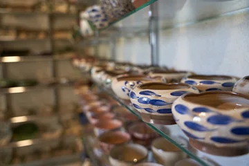 Fototapeten close up shot of Handicrafts for making carved ceramics in the tourist village of Tunis in Fayoum, Egypt © Mostafa Eissa