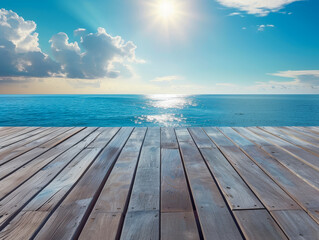 Fototapeta na wymiar Wooden deck overlooking a serene blue ocean under a cloudy sky. 